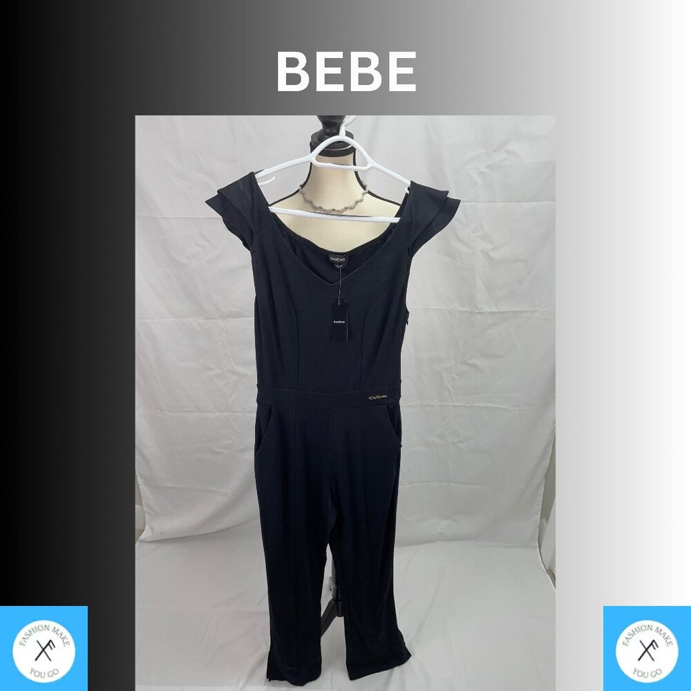 BEBE BLACK JUMPSUIT WITH SIDE ZIPPER AND POCKETS